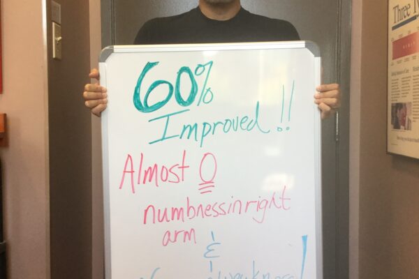 Pictured here is patient Almeida Aires displaying his progress acheived through treatment!